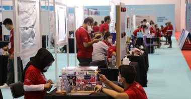 Young people are seen at stands at Turkey's largest aerospace and technology festival in southeastern Gaziantep province, Sept. 25, 2020. (AA Photo)