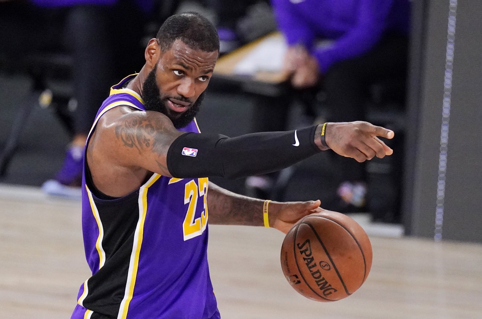 Los Angeles Lakers' LeBron James sets up a play during an NBA conference final playoff game against the Denver Nuggets, in Lake Buena Vista, Florida, U.S., Sept. 26, 2020. (AP Photo)