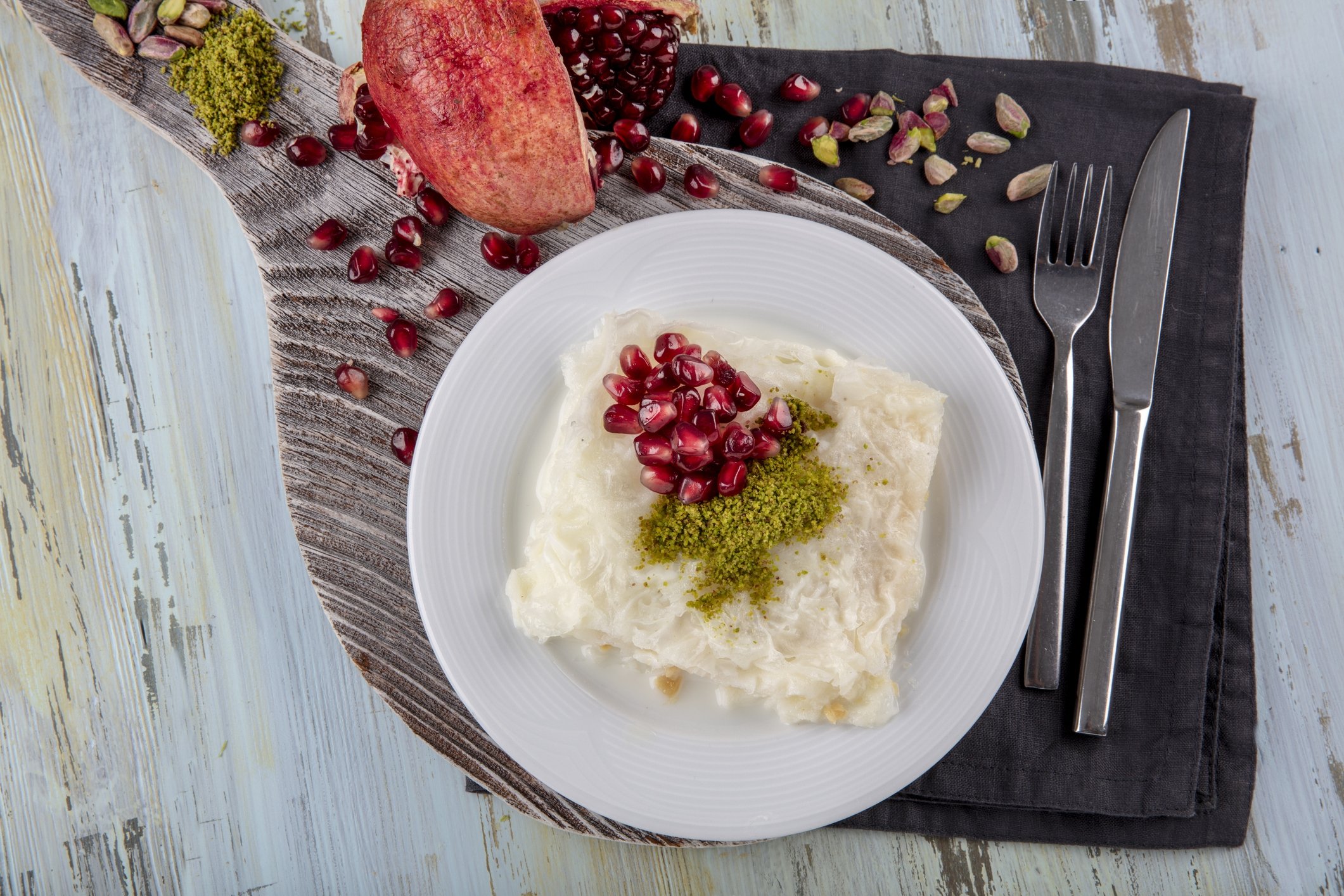 Traditional milky dessert Gullac,usually make in Ramadan with Gullac sheets,sugar,powder of pistachio,milk, pomegranate ,hazelnuts and walnut inside if desired.Dessert from Ottoman Cuisine. (iStock Photo)