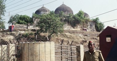 Security officers guard the Babri Mosque in Ayodhya, closing off the disputed site, Oct. 29, 1990. (AP Photo)