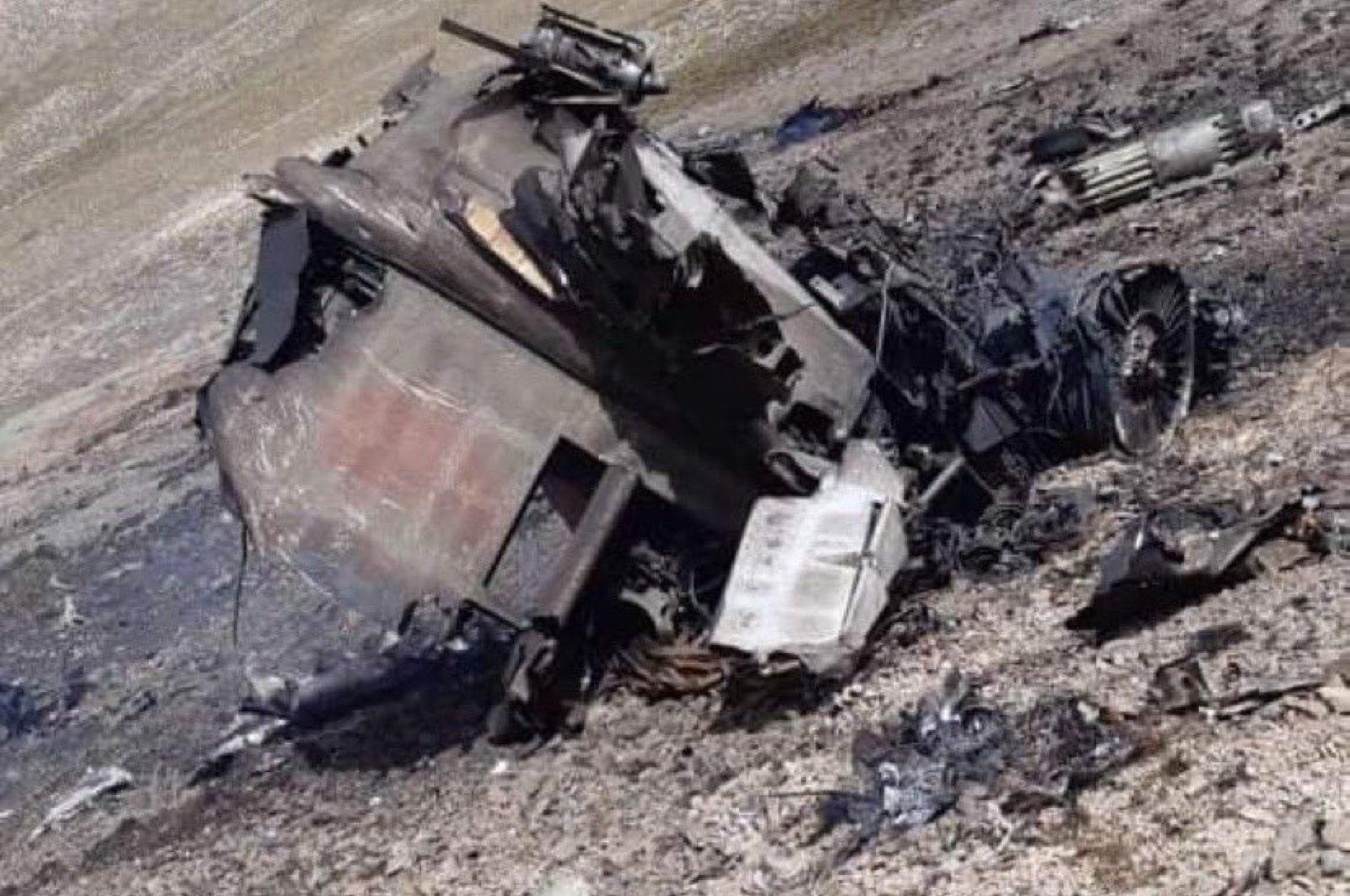 The remains of an Armenian Sukhoi Su-25 warplane that crashed into the mountains during fighting with Azerbaijan over the occupied Nagorny-Karabakh region, Azerbaijan, Sept. 30, 2020. (AFP)