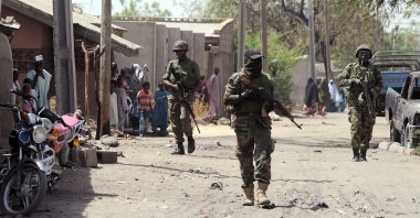 This file photo shows Nigerian troops patrolling the streets of the remote northeastern town of Baga, Borno State, Nigeria, April 30, 2013. (AFP Photo)