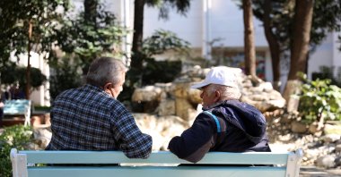 Two residents of Darülaceze nursing home chat in Istanbul, Turkey, Oct. 1, 2020. (AA Photo)