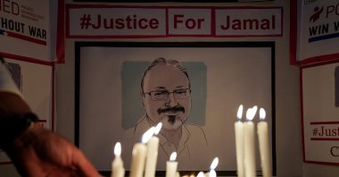 The Committee to Protect Journalists and other press freedom activists hold a candlelight vigil to mark the anniversary of the killing of journalist Jamal Khashoggi at the kingdom's consulate in Istanbul in front of the Saudi Embassy in Washington, D.C., Oct. 2, 2019. (REUTERS)