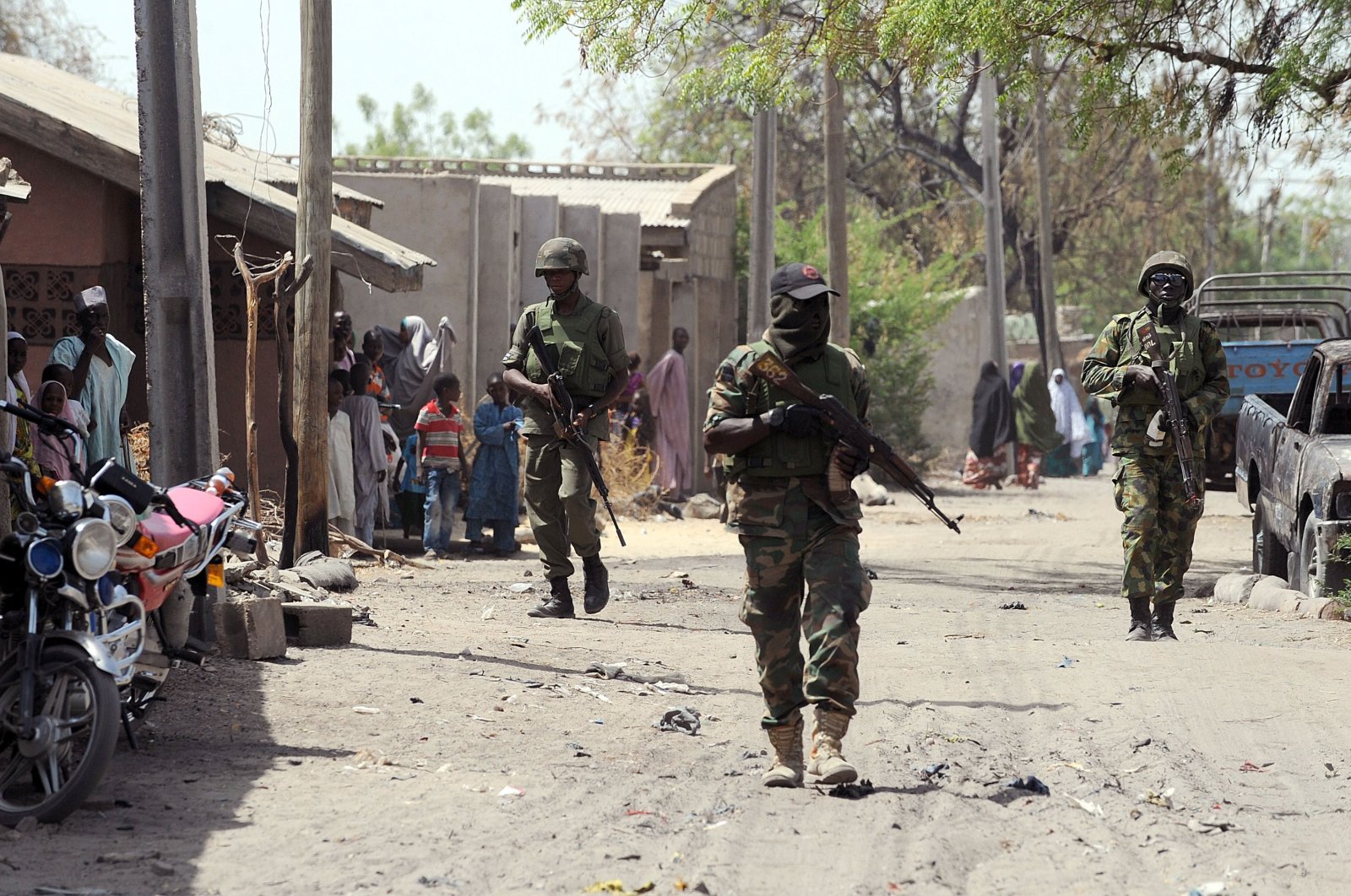 This file photo shows Nigerian troops patrolling the streets of the remote northeastern town of Baga, Borno State, Nigeria, April 30, 2013. (AFP Photo)