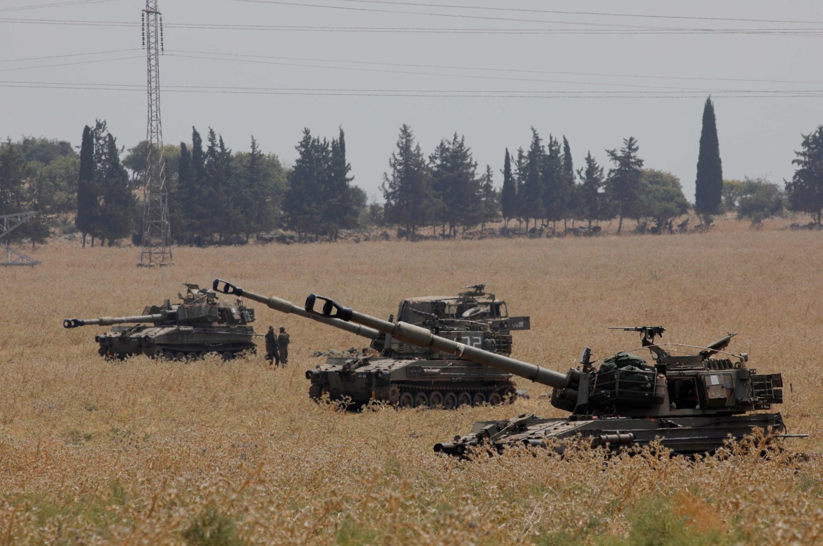 Israeli forces deploy 155-mm self-propelled howitzers in Upper Galilee in northern Israel on the border with Lebanon, July 27, 2020. (AFP Photo)