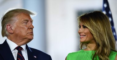 The U.S. First Lady Melania Trump smiles at U.S. President Donald Trump at the conclusion of the final day of the Republican National Convention from the South Lawn of the White House in Washington, D.C, Aug. 27, 2020. (AFP Photo)