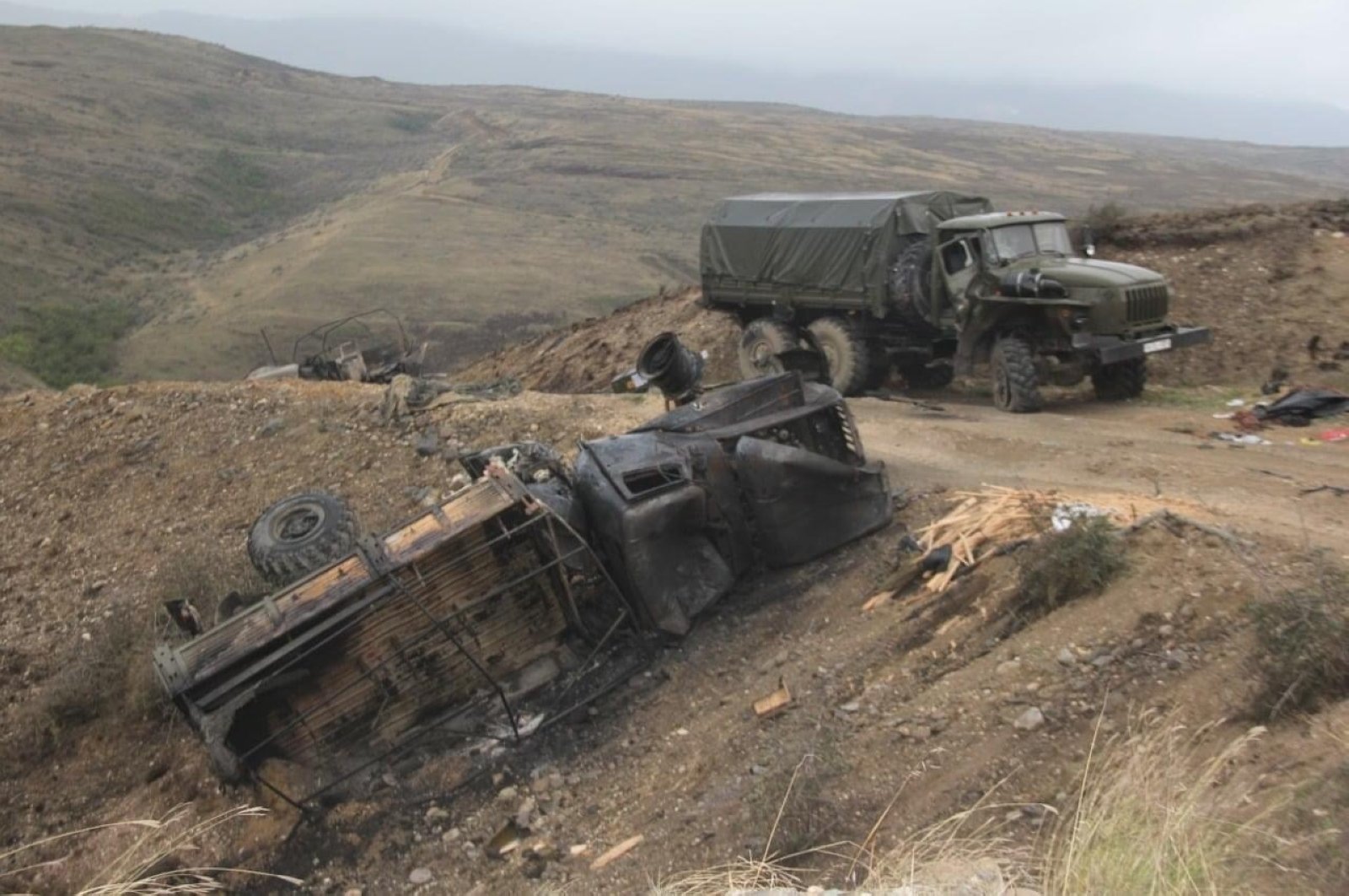 Armenian military vehicles damaged after Azerbaijan's retaliatory operations in response to Armenia's attacks in the occupied Nagorno-Karabakh region, Oct. 2, 2020. (AA Photo)