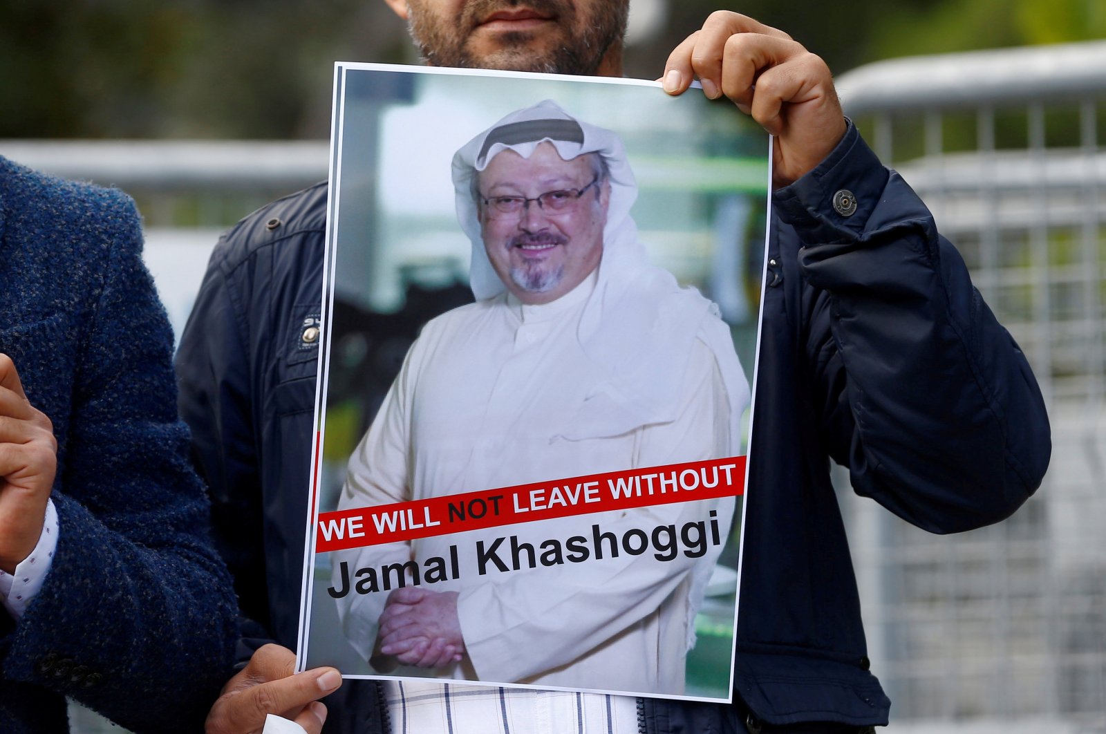 A demonstrator holds a picture of Saudi journalist Jamal Khashoggi during a protest in front of Saudi Arabia's consulate in Istanbul, Turkey, Oct. 5, 2018. (Reuters Photo)