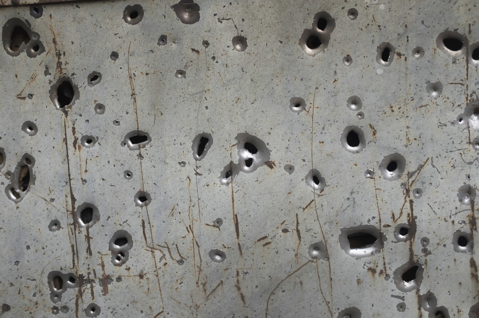 Shrapnel holes are seen in a fence in the Hadrut province of Armenian-occupied Nagorno-Karabakh, Azerbaijan, Oct. 1, 2020. (AP Photo)