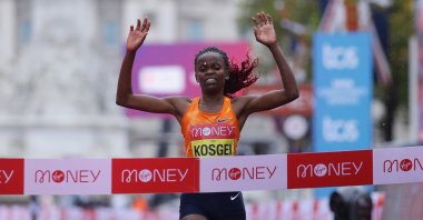 Brigid Kosgei celebrates winning the London Marathon, in London, England, Oct. 4, 2020. (Reuters Photo)