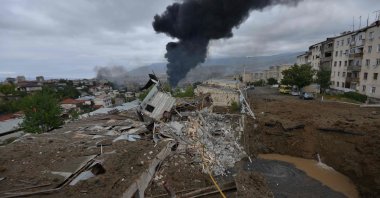 A view shows aftermath of recent shelling during the ongoing fighting between Armenia and Azerbaijan over the breakaway Nagorno-Karabakh region, in the disputed region's main city of Stepanakert on October 4, 2020. (AFP Photo)