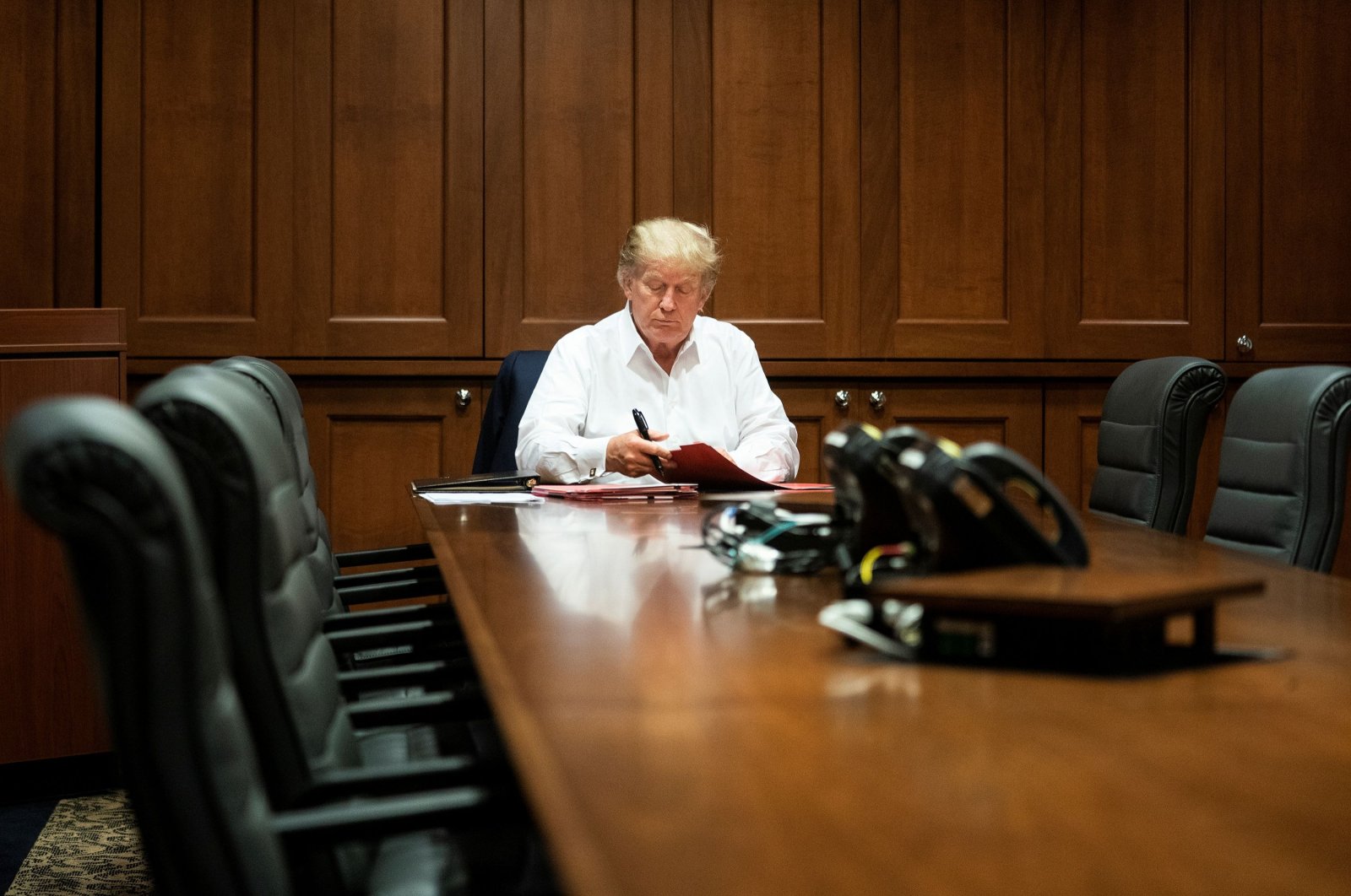 U.S. President Donald Trump works in a conference room while receiving treatment after testing positive for the coronavirus, at Walter Reed National Military Medical Center in Bethesda, Maryland, U.S., Oct. 3, 2020. (Reuters Photo)