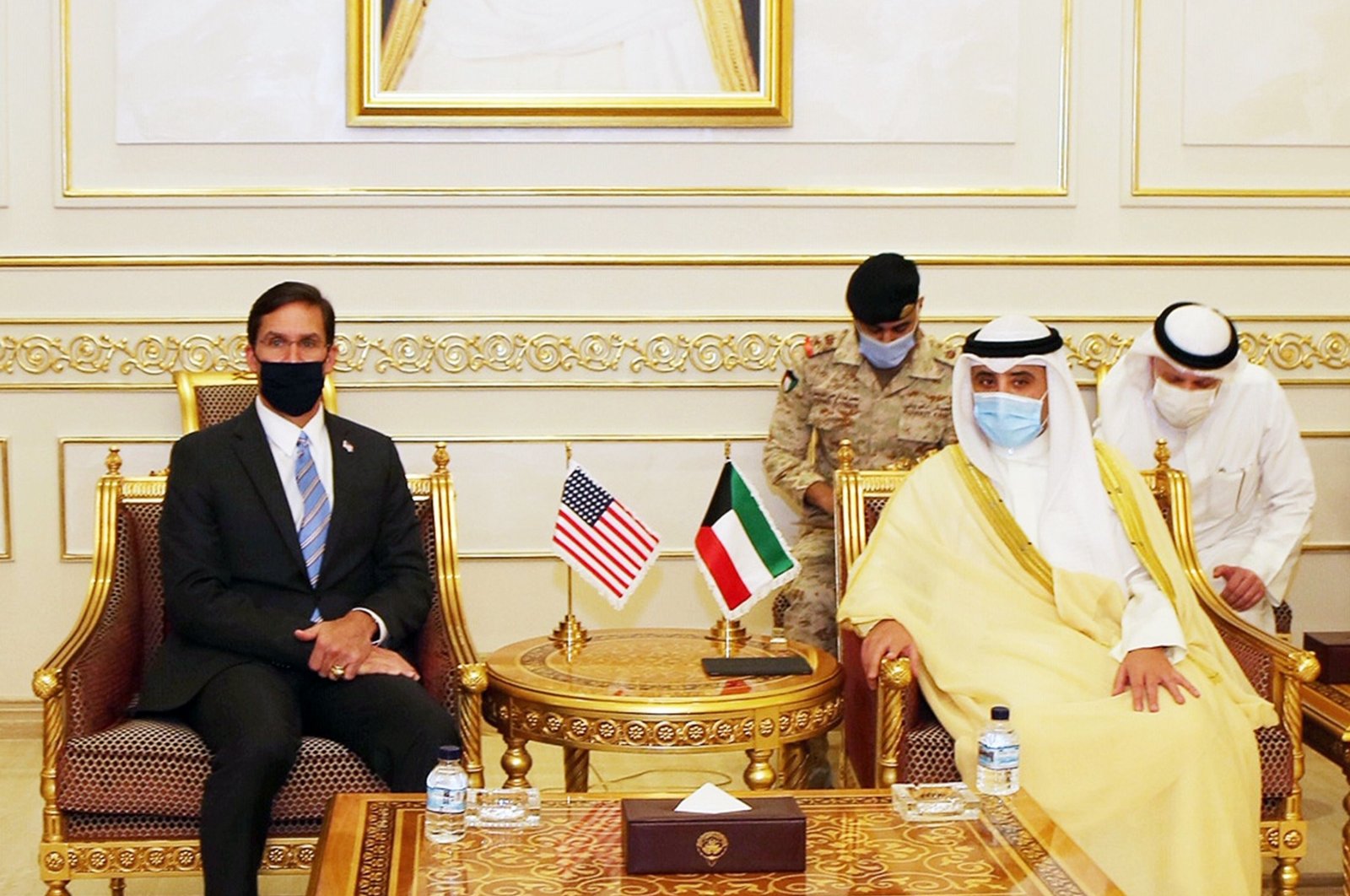 A handout picture released by the Kuwaiti Emiri Diwan shows Foreign Minister Ahmad Nasser al-Sabah (R) receiving U.S. Defense Secretary Mark Esper at the emiri terminal of the Kuwait international airport in the capital Kuwait City on Oct. 4, 2020. (Photo by Emir of Kuwait Diwan / AFP)
