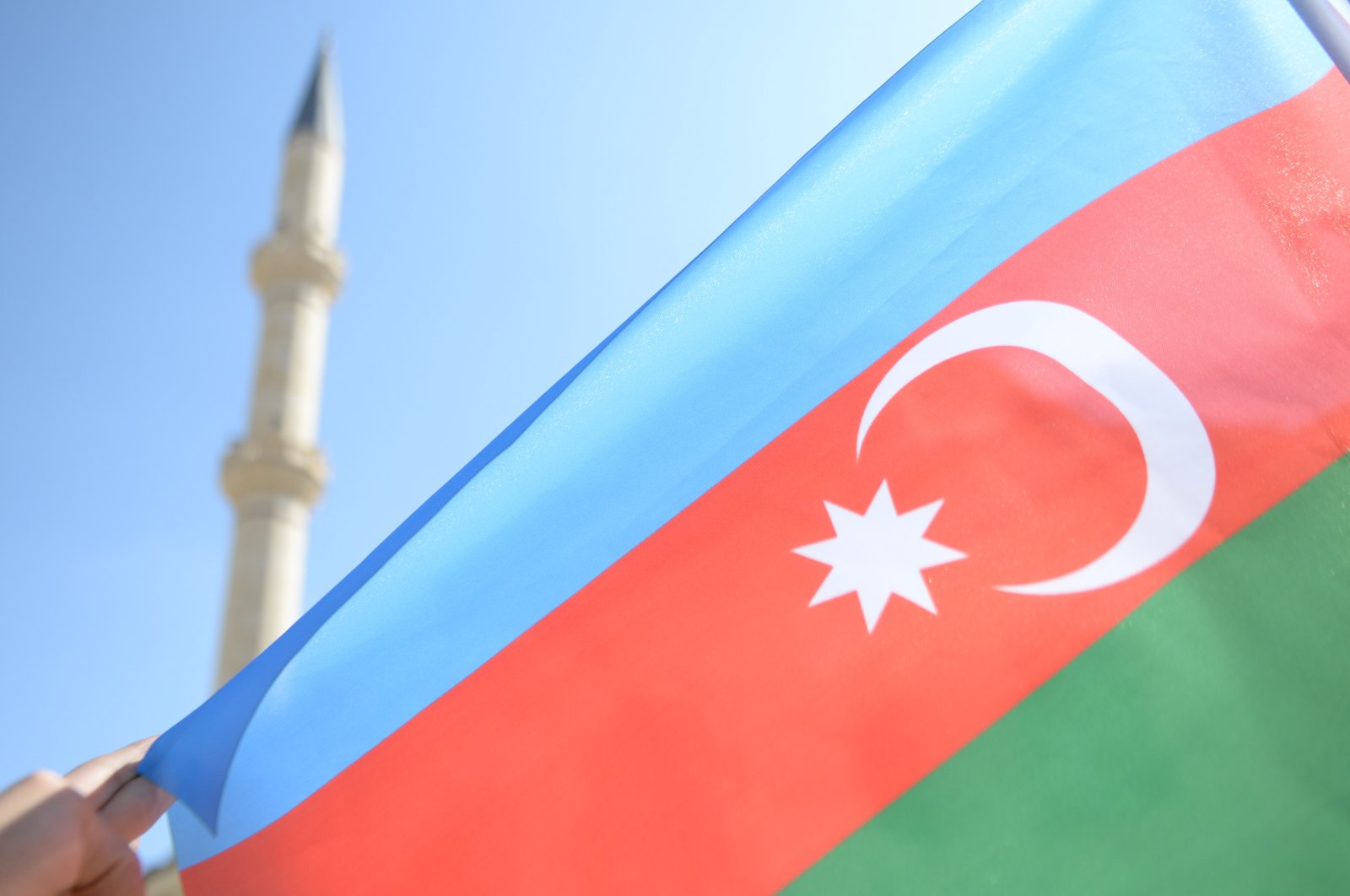 People in Turkey's Kahramanmaraş province wave the flag of Azerbaijan in a show of support during recent clashes between Baku and Yerevan over Armenian-occupied Nagorno-Karabakh, Oct. 2, 2020. (AA Photo)