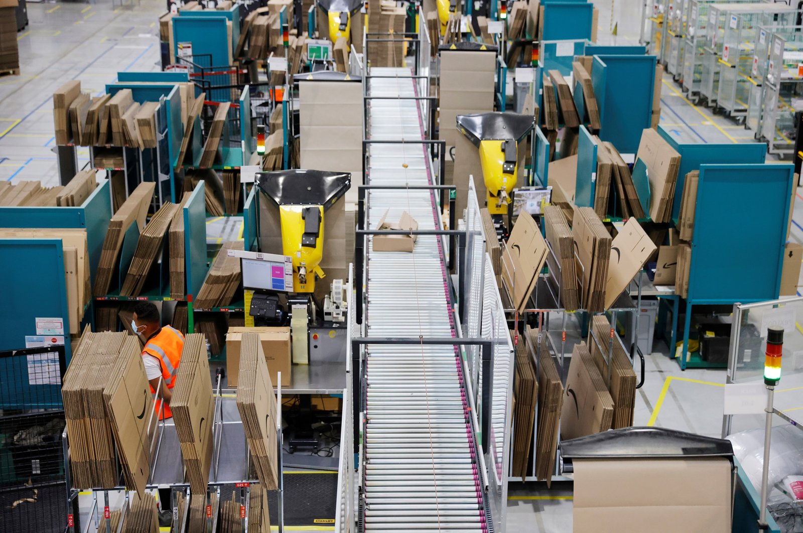 Employees work at the Amazon fulfillment center in Boves near Amiens, France, Sept. 29, 2020. (Reuters Photo)