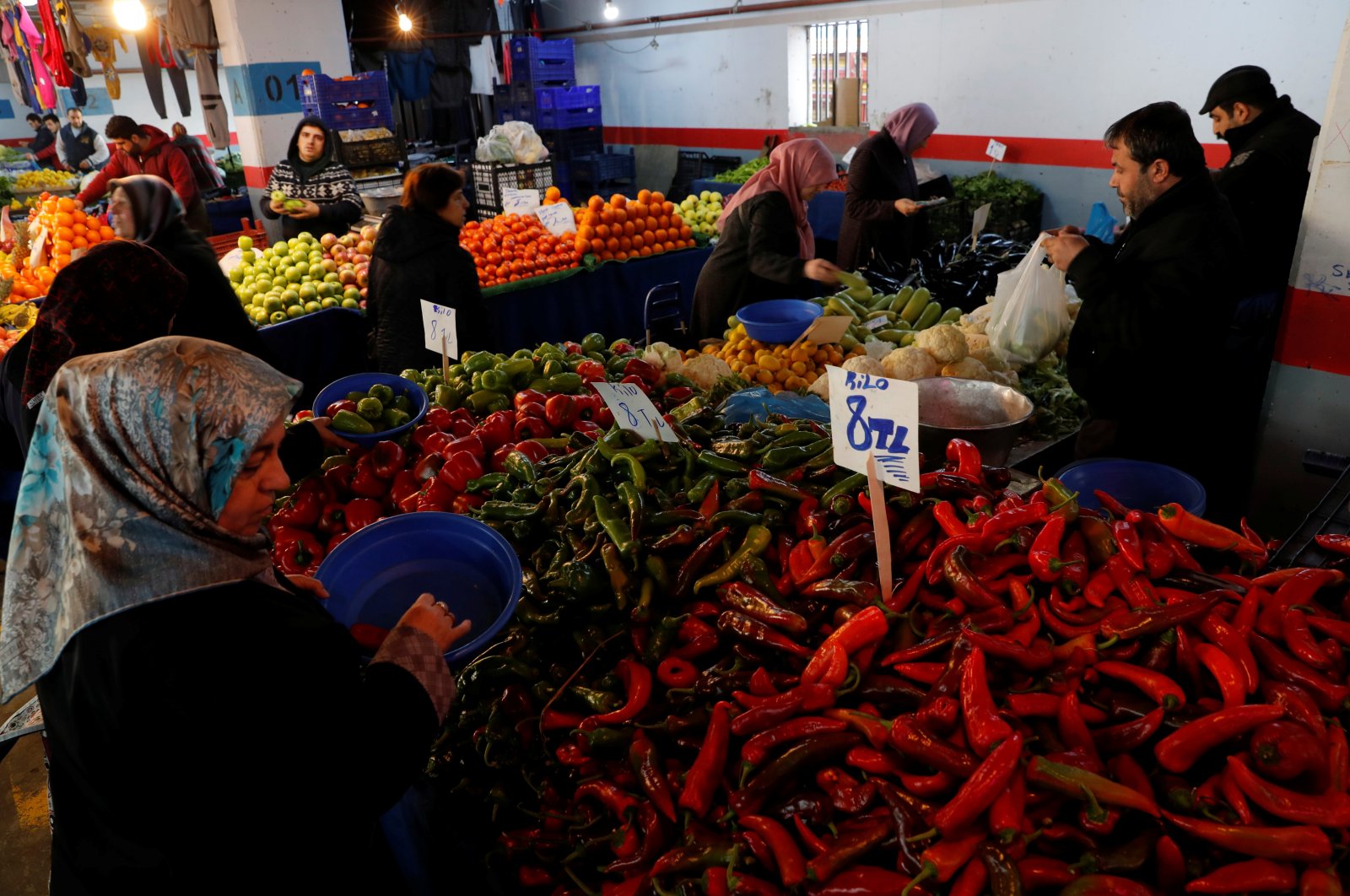 People shop at a food market in Istanbul, Turkey, Feb. 11, 2019. (Reuters Photo)