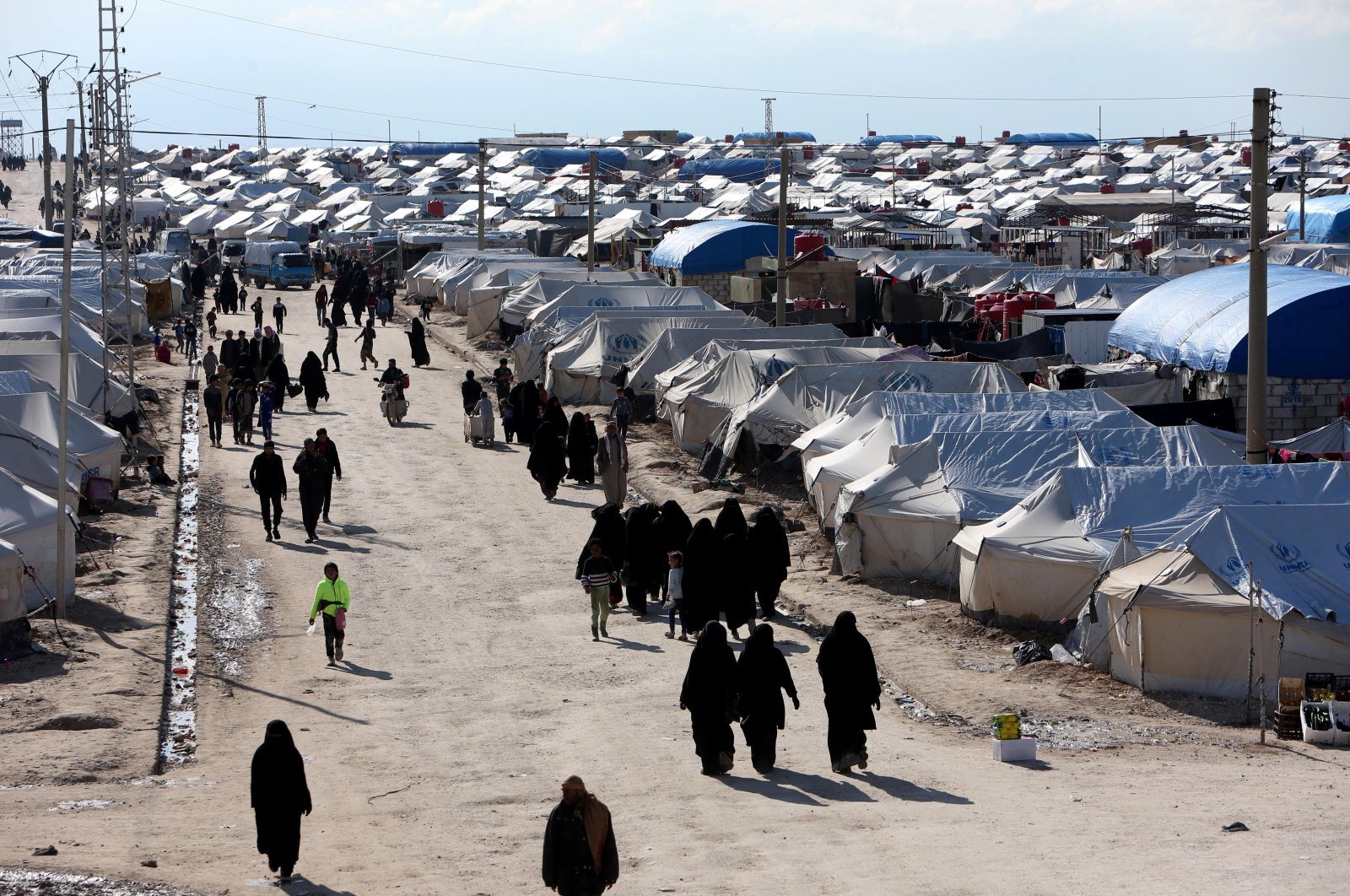 Women walk through al-Hol displacement camp in Hassakeh governorate, Syria, April 1, 2019. (Reuters Photo)