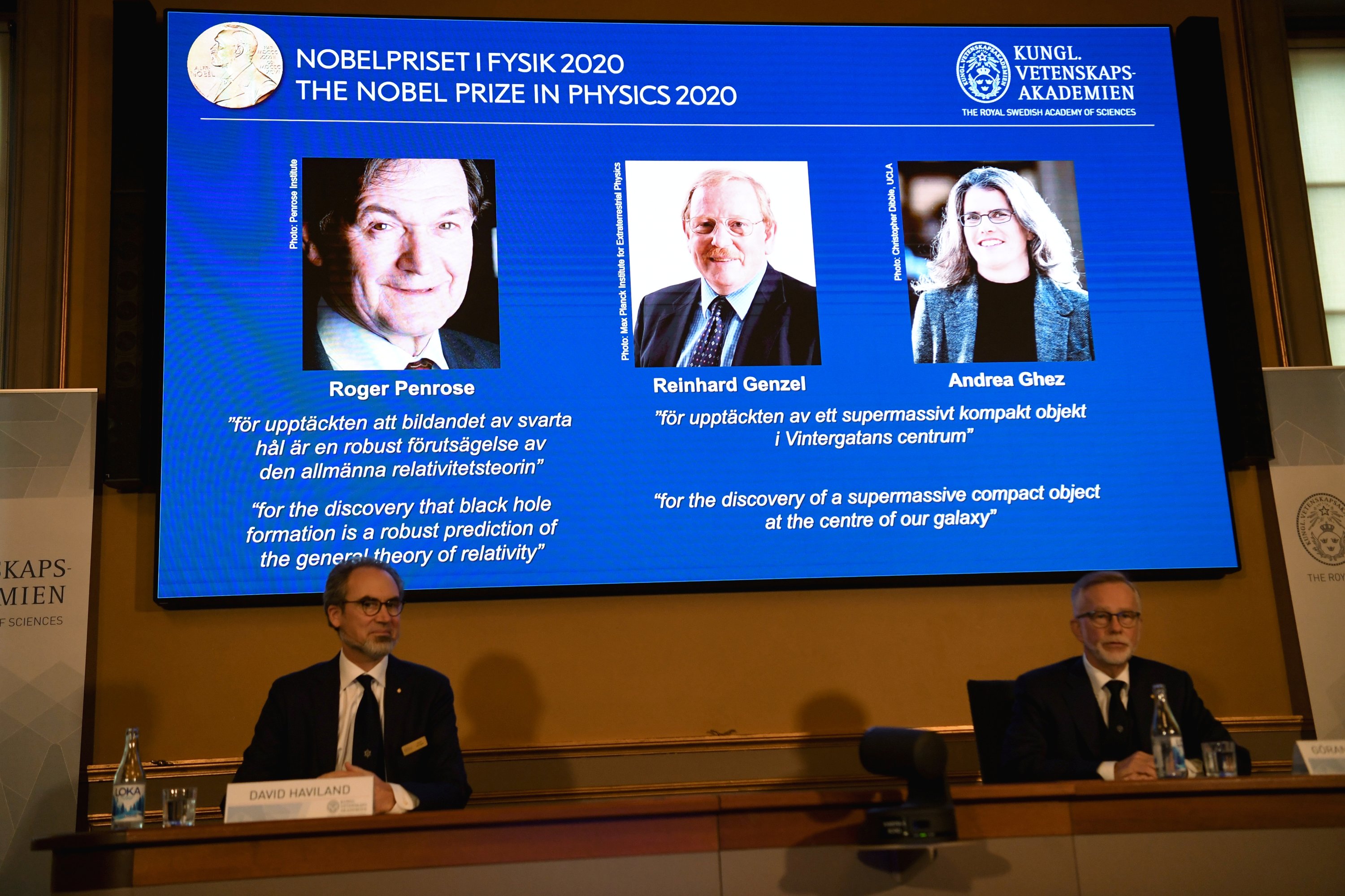 David Haviland, member of the Nobel Committee for Physics, left, and Secretary General of the Royal Swedish Academy of Sciences Goran K. Hansson announce the winners of the 2020 Nobel Prize in Physics during a news conference at the Royal Swedish Academy of Sciences, in Stockholm, Sweden, Oct. 6, 2020. (TT News Agency via Reuters)