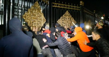 Protesters try to break into the government headquarters during a rally against the result of a parliamentary election in Bishkek, Kyrgyzstan, Oct. 5, 2020. (Reuters Photo)