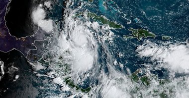 A satellite image shows Tropical Storm Delta in the Caribbean, Oct. 6, 2020. (AFP Photo/RAMMB/NOAA)