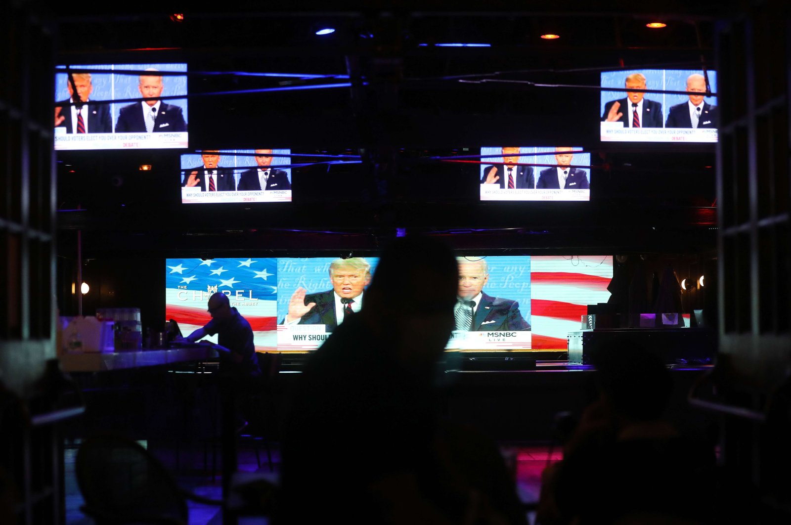 A broadcast of the first debate between U.S. President Donald Trump and Democratic presidential nominee Joe Biden is shown on televisions, in West Hollywood, California, U.S., Sept. 29, 2020. (AFP Photo)