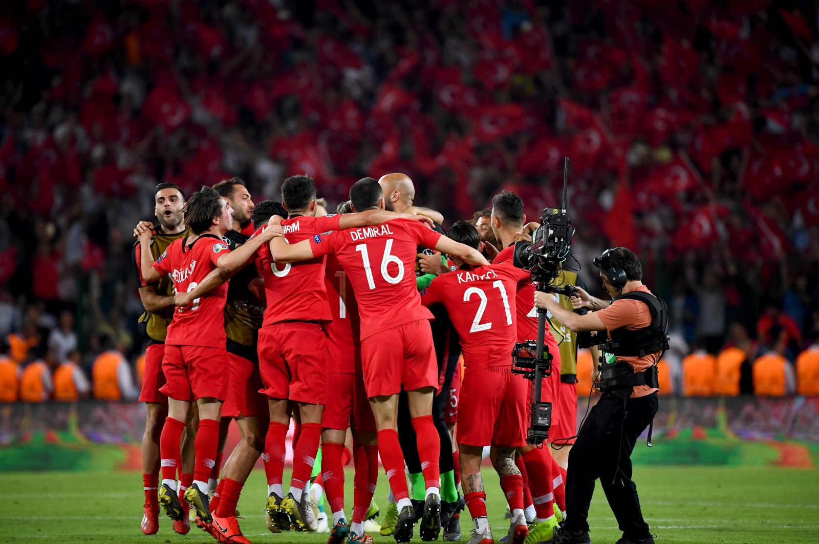 Turkey players celebrate after a Euro 2020 qualification match, in Konya, Turkey, June 8, 2019. (AFP Photo)