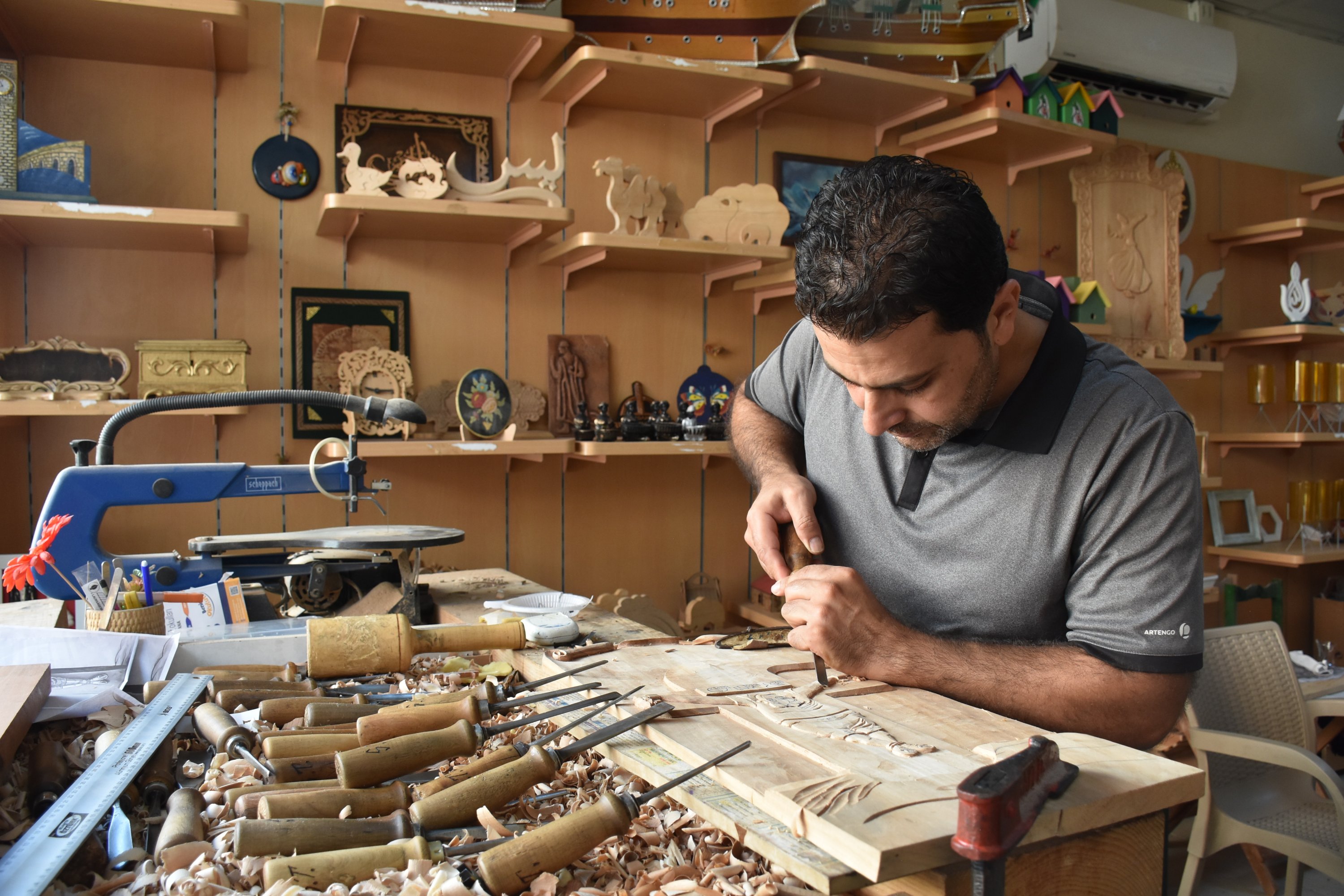 Serdar Tektaş works in his workshop in Adana, southern Turkey, Oct. 6, 2020. (AA Photo)