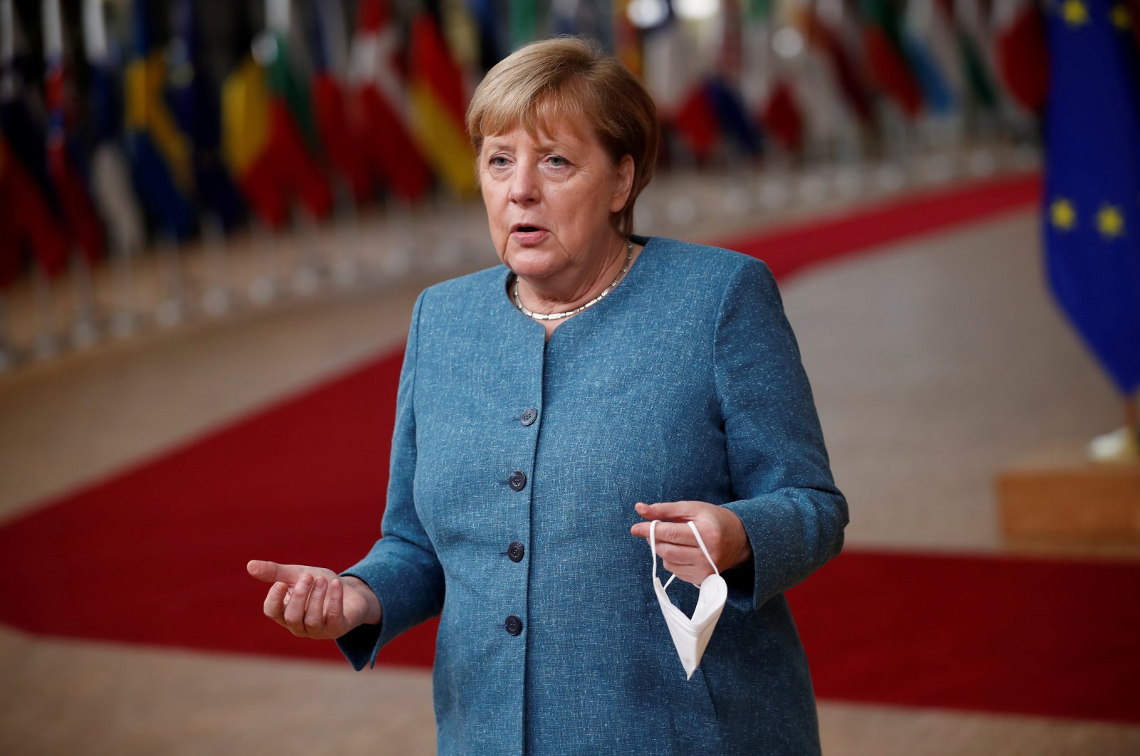 German Chancellor Angela Merkel speaks to the media as she arrives for the second face-to-face European Union summit since the COVID-19 outbreak, in Brussels, Belgium, Oct. 1, 2020. (Reuters Photo)