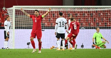 Turkey's midfielder Ozan Tufan celebrates the 3-3 goal for Turkey, in Cologne, Germany, Oct. 7, 2020. (AFP Photo) 