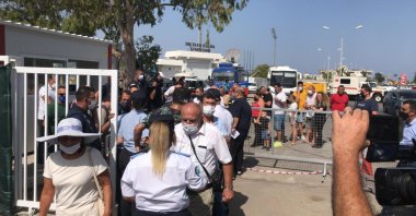 People line up to enter the abandoned town of Varosha (Maraş) on the divided island of Cyprus, Oct. 8, 2020. (AA Photo)