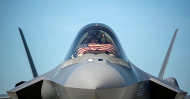 An F-35 pilot prepares for takeoff from the Vermont Air National Guard Base with the flag of the United States, before a flyover in South Burlington, Vermont, U.S. May 22, 2020. (Reuters Photo)