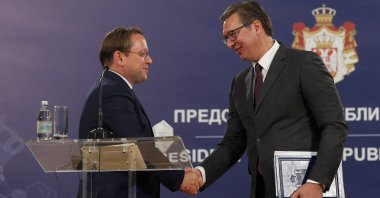 European Commissioner for Neighborhood and Enlargement Oliver Varhelyi (L) shakes hands with Serbian President Aleksandar Vucic (R) after their meeting in Belgrade, Serbia, Oct. 8, 2020. (EPA Photo)