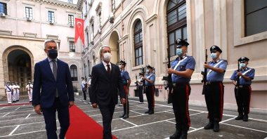 Turkish Defense Minister Hulusi Akar (R) walks beside his Italian counterpart Lorenzo Guerini during a military ceremony at the Italian Defense Ministry, Rome, Italy, Oct. 9, 2020. (IHA Photo)