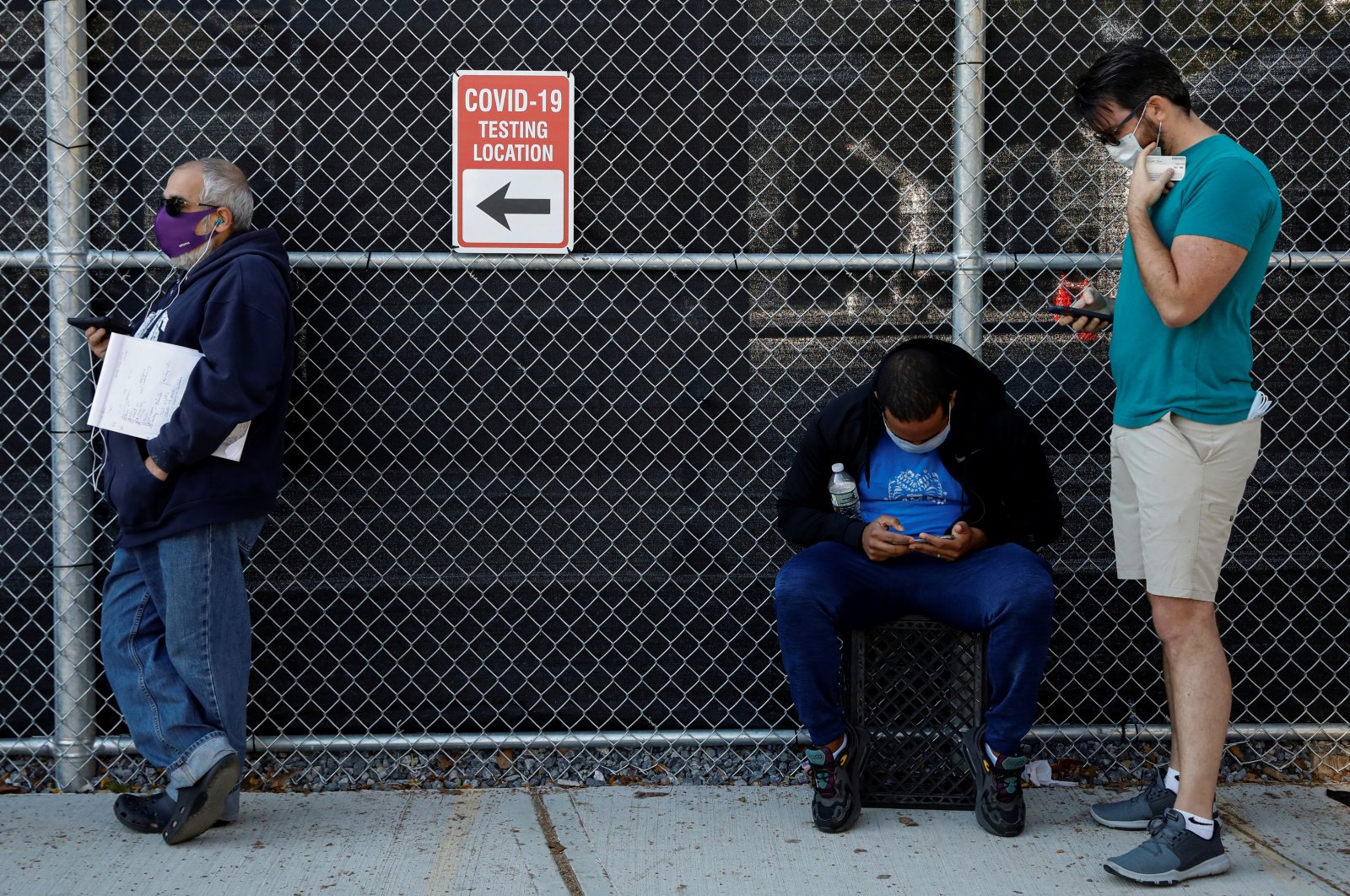 People wait in line to be tested for the coronavirus at a testing center in the Borough Park section of Brooklyn, New York City, New York, U.S., Oct. 8, 2020. (Reuters Photo)