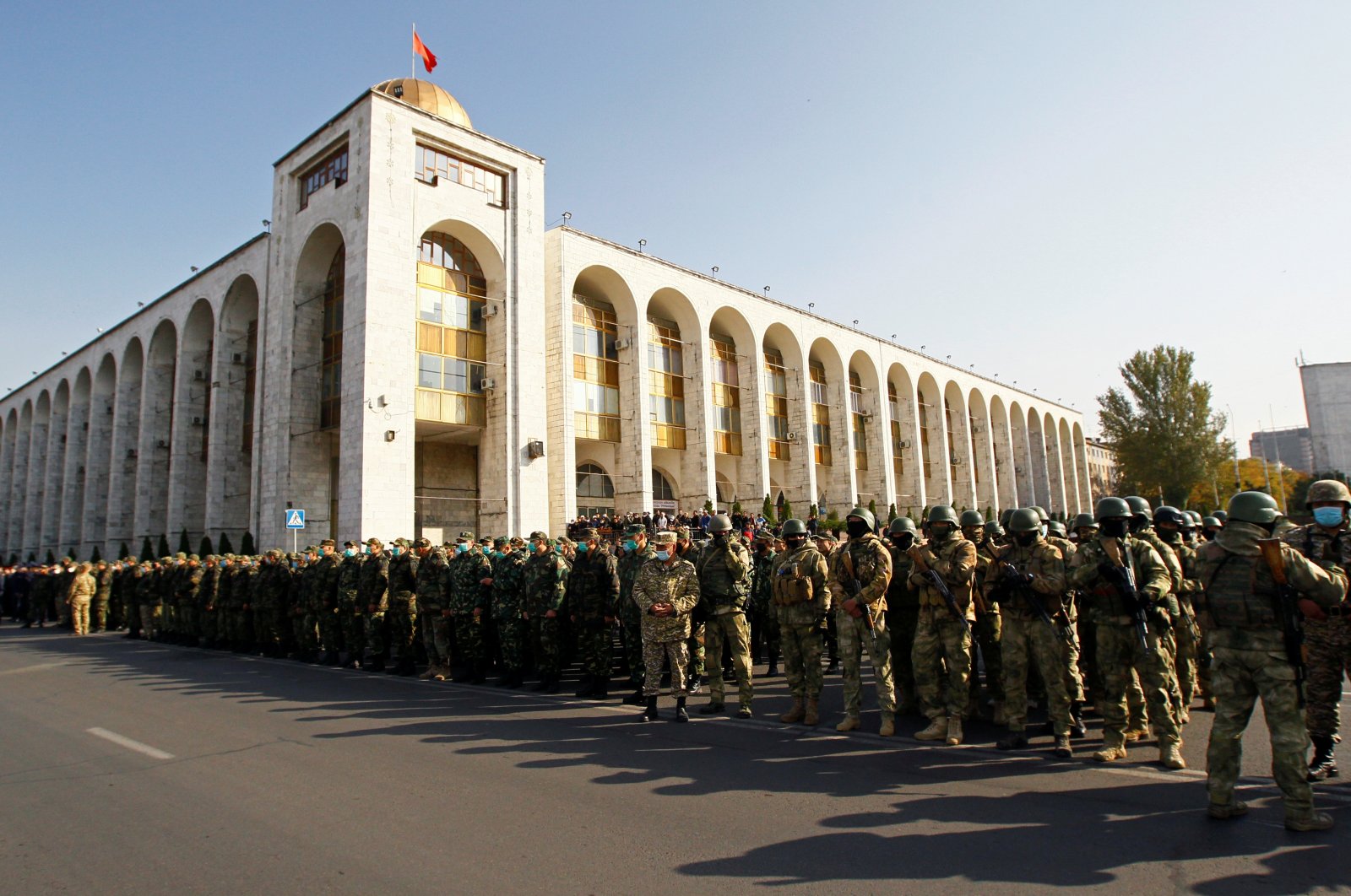 Members of armed forces stand in formation in Ala-Too Square after authorities declared a state of emergency in the capital and ordered troops to be deployed there, in Bishkek, Kyrgyzstan, Oct. 10, 2020. (Reuters Photo)