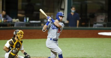 Los Angeles Dodgers center fielder Cody Bellinger hits an RBI triple, in Arlington, Texas, United States, Oct. 8, 2020. (REUTERS Photo) 