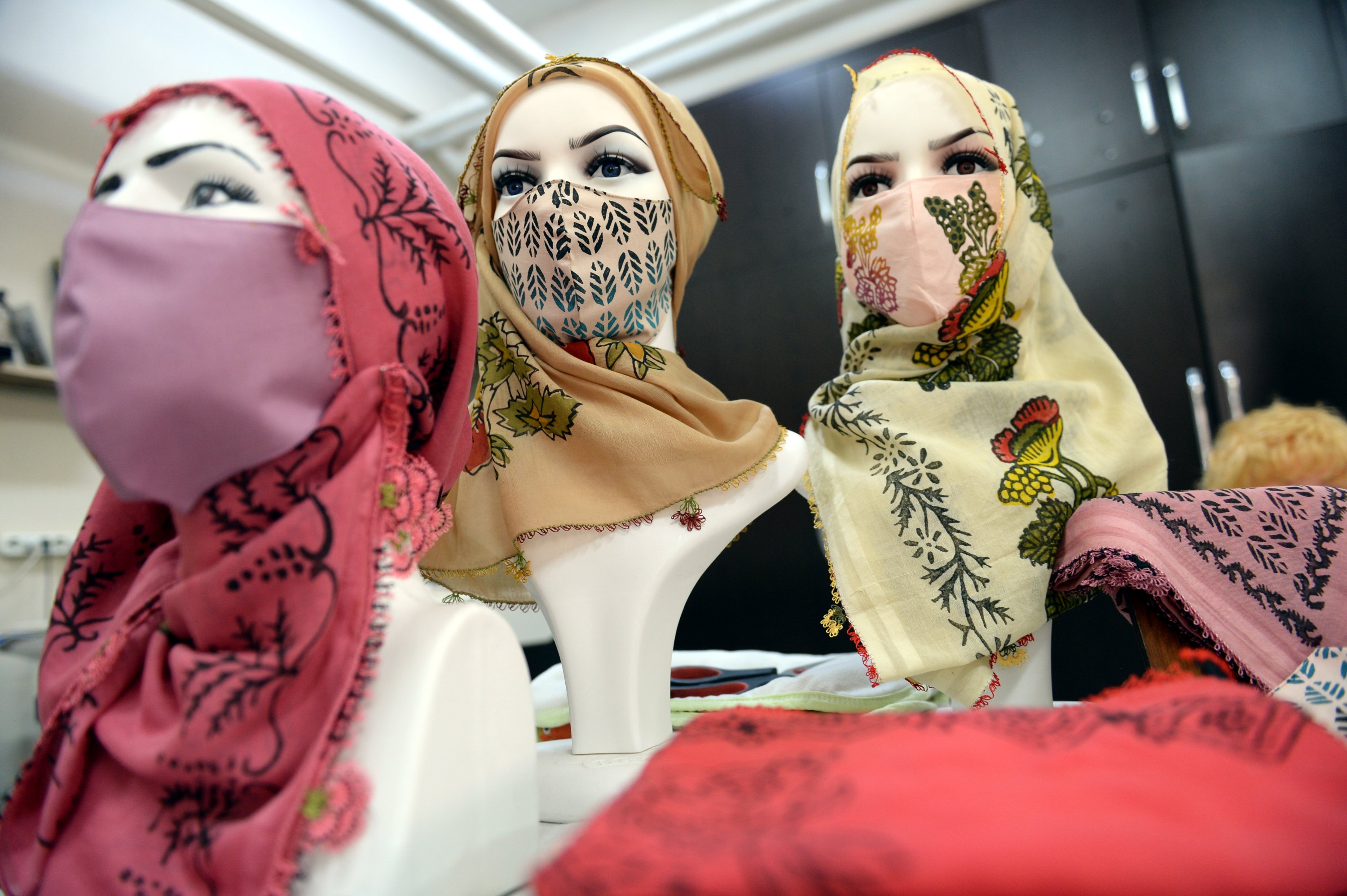 Photo shows various face masks and headscarves created from traditional yazma fabrics and motifs in Tokat, northern Turkey. (AA Photo) 