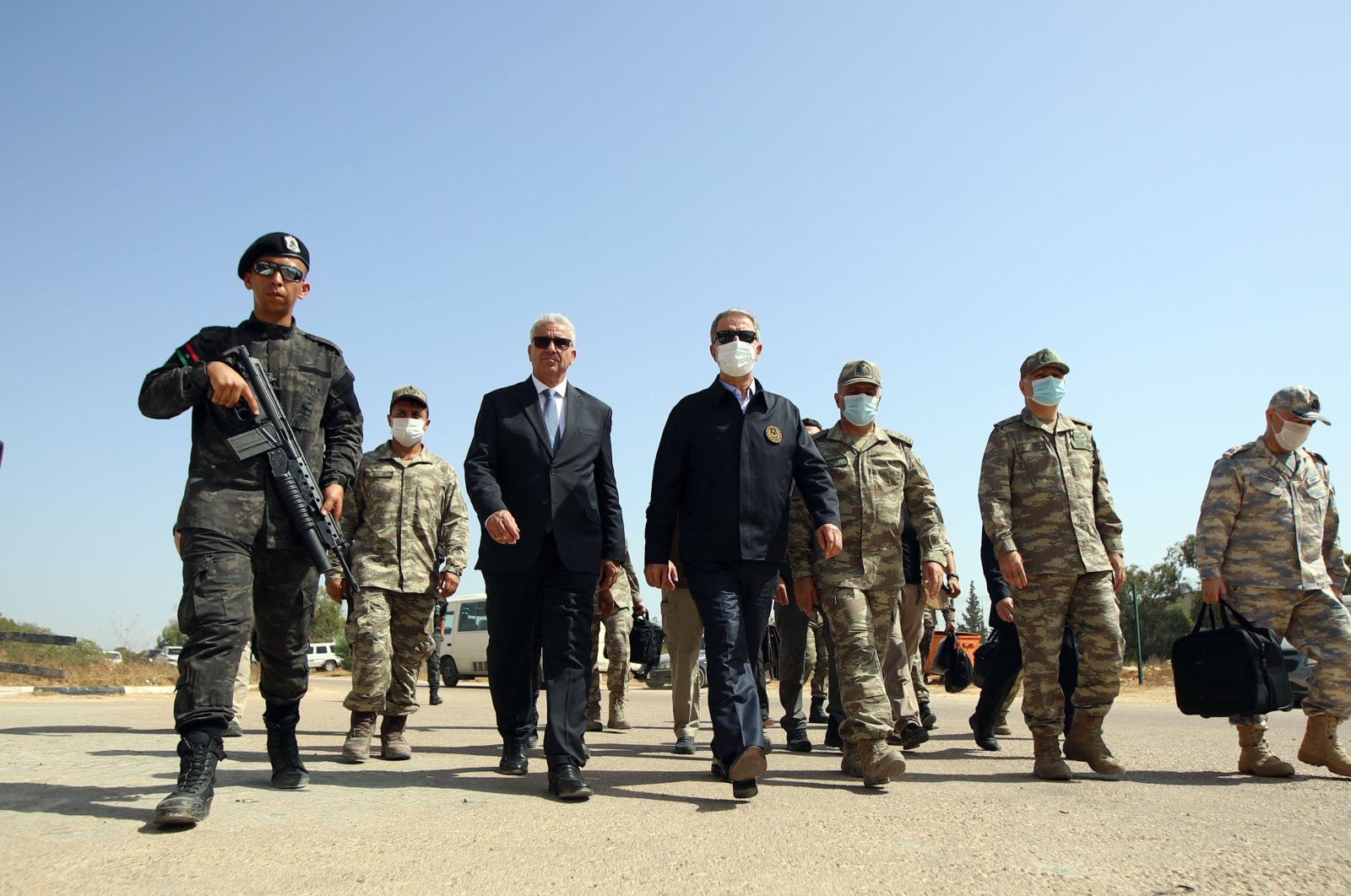 Defense Minister Hulusi Akar (C) visits Turkish troops in Libya, July 5, 2020. (AA Photo)