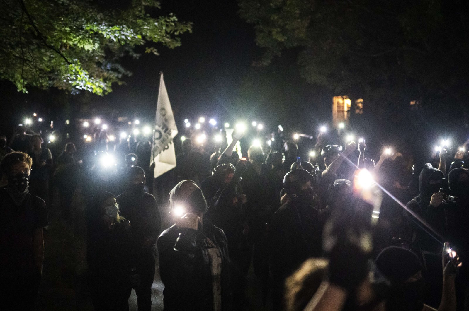 Protesters chant while marching to Kelly Penumbra police building during a protest against racial injustice and police brutality, Portland, Oregon, Oct. 2, 2020. (AFP Photo)