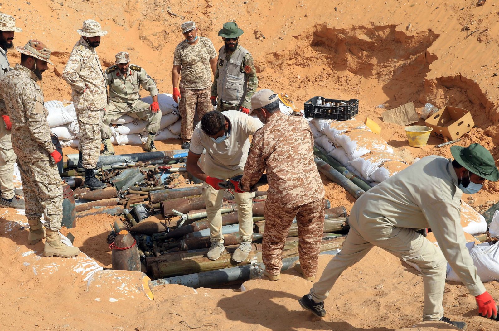 Military engineers of the U.N.-recognized Libyan Government of National Accord (GNA) prepare to dispose of ammunition and explosives in Tripoli, Libya, Oct. 12, 2020. (EPA Photo)