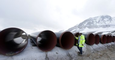A local employee marks pipes at the nearby Marta Pass, the highest point of the Trans Adriatic Pipeline (TAP) in Korce, Albania, April 17, 2019. (Reuters Photo)