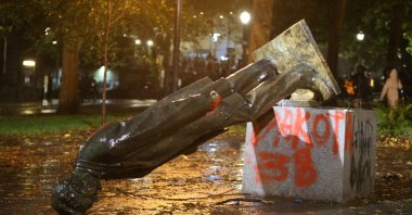 A group of protesters toppled statues of former Presidents Theodore Roosevelt and Abraham Lincoln in Portland's South Park Block, Oregon, U.S., Oct. 11, 2020. (AP Photo)