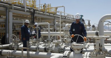Employees work at the Tawke oil field in the Kurdistan Regional Government (KRG) of northern Iraq, May 31, 2009. (AP Photo)