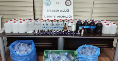 Police display bootleg alcohol seized in an operation in Balıkesir, western Turkey, Oct. 13, 2020. (AA Photo) 