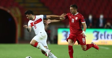 Turkey's Ozan Tufan dribbles past Serbia's Dusan Tadic during a UEFA Nations League match in Belgrade, Serbia, Sept. 6, 2020. (Reuters Photo)
