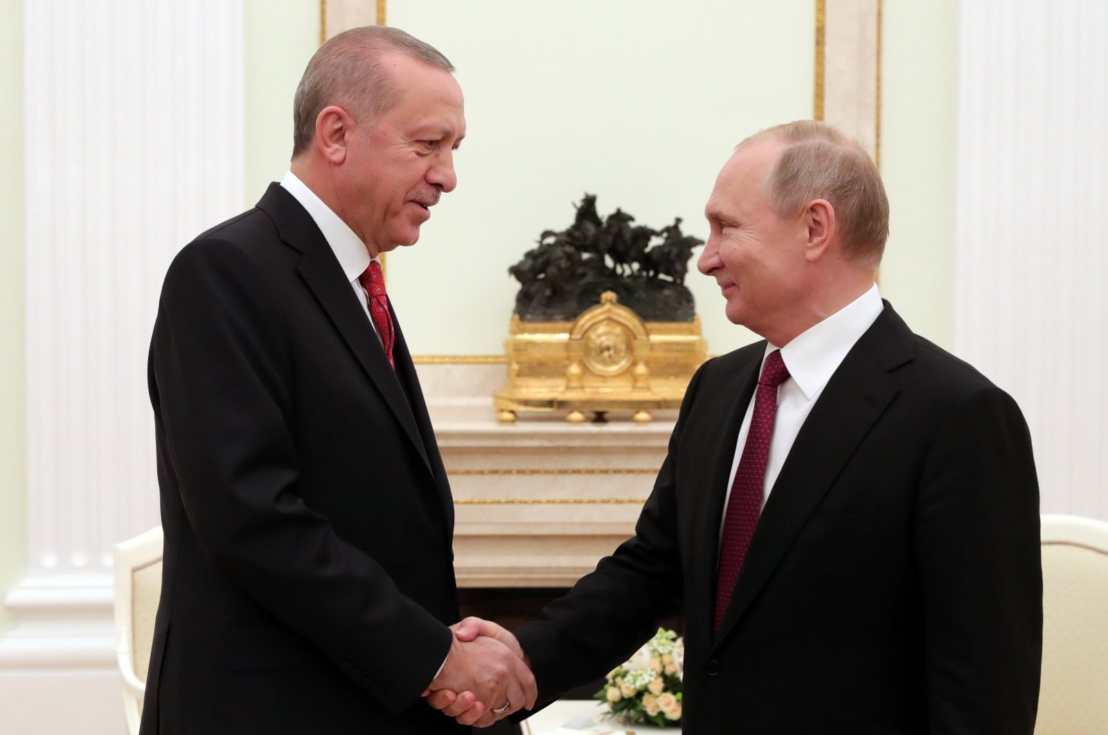 President Recep Tayyip Erdoğan shakes hands with Russian President Vladimir Putin prior to their talks in Moscow on Jan. 23, 2019. (AP Photo)