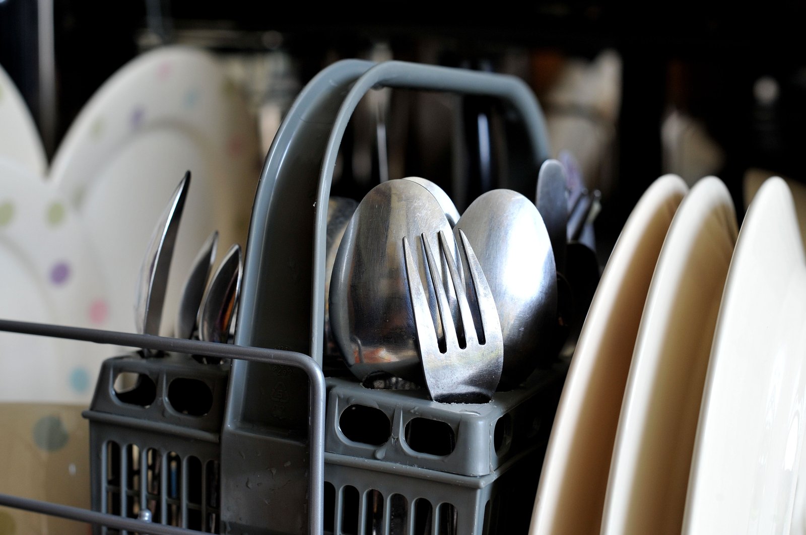 Dirty crockery and eating utensils wait to be washed in a dishwasher. (Reuters File Photo)