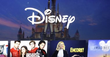 In this Nov. 13, 2019, file photo a Disney logo forms part of a menu for the Disney  movie and entertainment streaming service on a computer screen in Walpole, Massachusetts, U.S. (AP Photo)