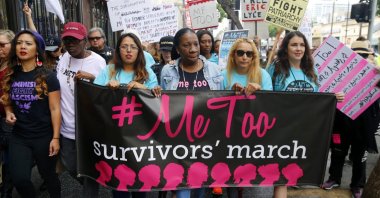 Tarana Burke (C), founder and leader of the #MeToo movement, marches with others at the #MeToo March in the Hollywood section of Los Angeles, California, U.S. Nov. 1, 2017. (AP Photo)